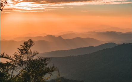 a beautiful landscape of mountainous view in a sceneric sunset